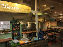 Load image into Gallery viewer, wooden longboard in restaurant