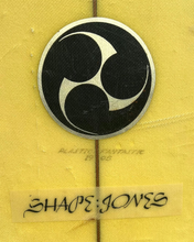 Load image into Gallery viewer, Foil black and white circular design on a yellow background with 'Shape Jones' branding.
