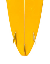 Load image into Gallery viewer, Close-up of a yellow surfboard with fins on a white background