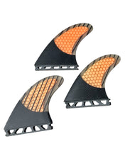 Load image into Gallery viewer, Three Future surfboard fins with orange honeycomb pattern on a white background