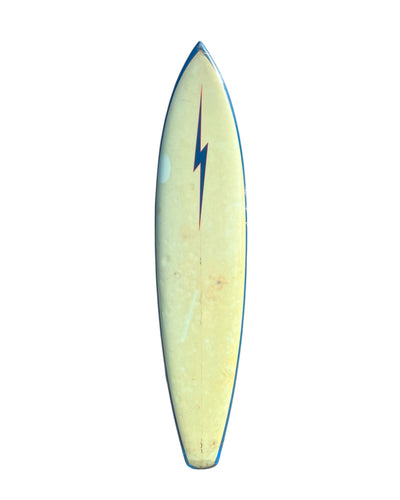 Gerry Lopez surfboard with a blue lightning bolt design on a white background
