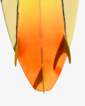 Load image into Gallery viewer, Close-up of a surfboard with a gradient design transitioning from yellow to orange on a white background.