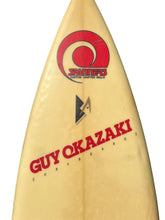 Load image into Gallery viewer, Surfboard with Guy Okazaki branding on a white background