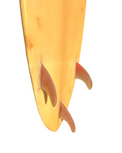 Load image into Gallery viewer, Close-up of surfboard fins on a white background