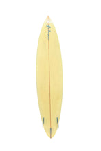 Load image into Gallery viewer, A vintage-style surfboard in cream color, featuring a wood center stripe, blue tail fins, and blue script branding near the nose, shown against a plain white background.