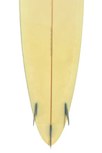 Load image into Gallery viewer, The bottom half of a cream color surfboard with a red centerline and three blue fins, shown against a white background.
