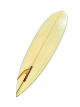 Load image into Gallery viewer, A vintage-style longboard surfboard in a pale yellow color, shown diagonally on a plain white background.