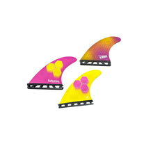 Load image into Gallery viewer, Three surfboard fins in pink, yellow, and orange gradient colors with black bases, displayed on a solid white background.