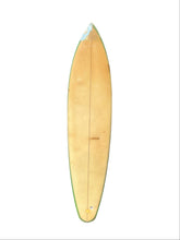 Load image into Gallery viewer, A long, narrow surfboard shown from above on a plain white background. The deck is a light natural cream color tone with a green edge and a small patch of blue water near the nose.