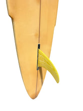 Load image into Gallery viewer, A close-up of a surfboard tail with a bright yellow fin attached, shown against a plain white background.