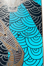 Load image into Gallery viewer, Close-up of a decorative board featuring a bold turquoise blue wave pattern outlined in black, alongside black and brown geometric tribal-style designs.