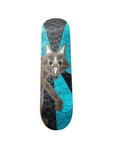Load image into Gallery viewer, A skateboard deck featuring a stylized fox illustration over a black and turquoise wave pattern, shown against a plain white background.