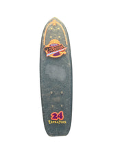 Load image into Gallery viewer, A longboard skateboard deck with a dark gray grip-tape surface, featuring a 'Huffy' graphic in orange and yellow near the nose and a red and yellow '24 Ultraflex' logo near the tail, shown against a plain white background.