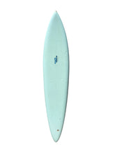 Load image into Gallery viewer, A light baby blue surfboard shown vertically against a solid white background, featuring a small blue 'sunset' brand logo in the center.