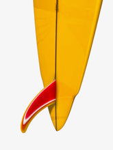Load image into Gallery viewer, Close-up of the tail section of a bright yellow surfboard with a red and white fin attached, shown against a plain light gray background.